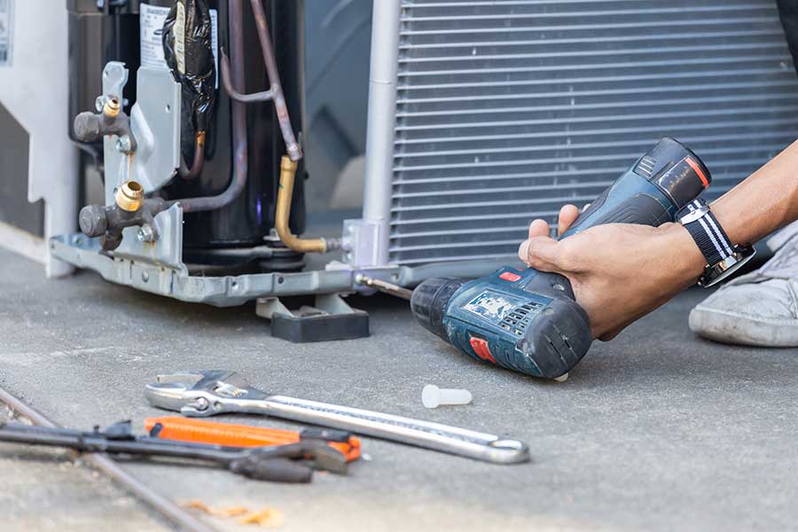 Technician Performing AC Repair